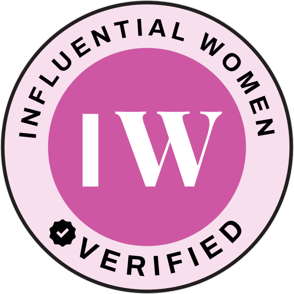 Badge with uppercase black text in a light pink ring "INFLUENTIAL WOMEN VERIFIED" around a darker pink circle with the letters IW